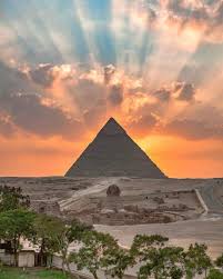Pyramids of Giza at sunset